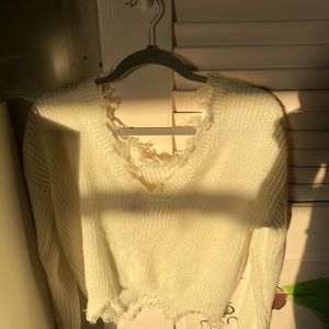 Ribbed neck white sweater off the shoulder